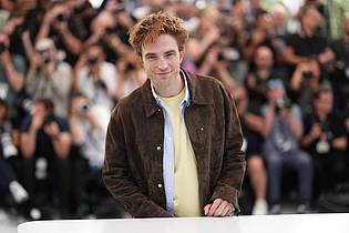 Scott A Garfitt/Invision/AP/dpa | Robert Pattinson ist an der Seite von Jennifer Lawrence im Film zu sehen.